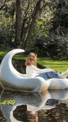 Evening visitors enjoy artistic park installations in Naucalpan