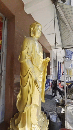 Religious statue workshop documented in early morning Nha Trang