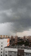 Thunderstorm with lightning strikes urban residential area