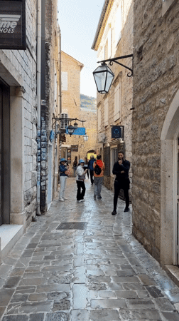 Ordinary life unfolds in Budva's streets and beaches