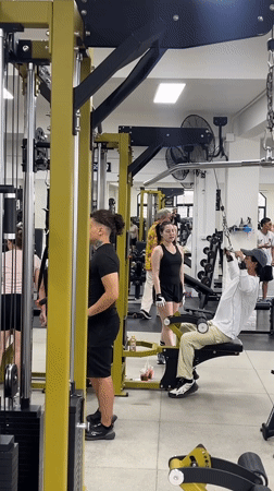 Gym workout in Chiang Mai with rainstorm outside
