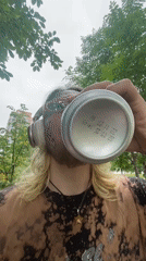 Low-angle shot through green leaves in Khabarovsk