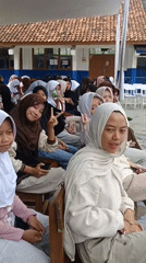 Traditional cultural gathering with decorated baskets in Tanjungsari