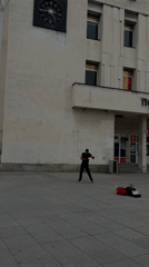 Boxer practices with tennis ball in Plovdiv public square