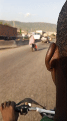 Motorcycle riders navigate Lokoja streets in routine daily travel