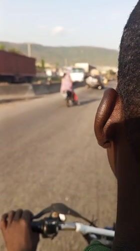 Motorcycle riders navigate Lokoja streets in routine daily travel