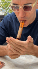 Relaxed outdoor smoking and drinking scene documented in Petah Tikva