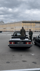 Formal military ceremony with parade car in city square