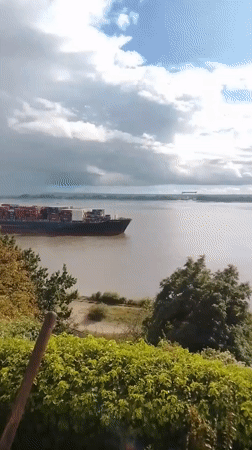 Heavy container traffic on the Elbe River, Hamburg