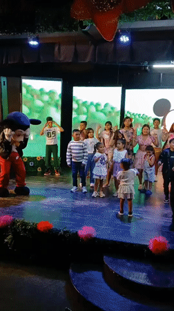 Disney characters pose with families at Porlamar event
