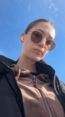 Woman takes morning selfies in Sofia, Bulgaria