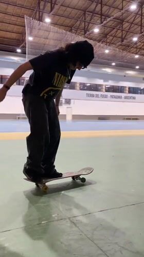 Late-night skateboarding session captured at Ushuaia gymnasium