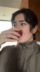 Woman enjoys fruit and drinks in Puebla, Mexico