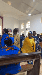 Sunday church service in Jos, Nigeria, with drumming and traditional dress