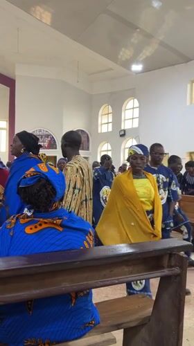Sunday church service in Jos, Nigeria, with drumming and traditional dress