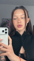 Woman records selfie video in Moscow