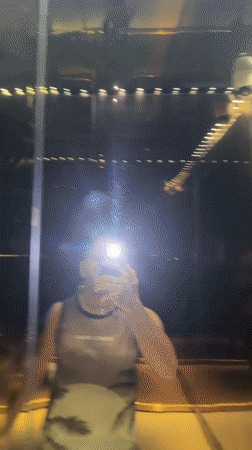 Man takes selfies in mirrored elevator in Kuala Lumpur