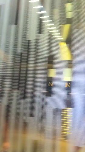 Man takes selfies in mirrored elevator in Kuala Lumpur
