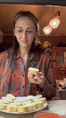 Woman prepares evening meal in Khimki home