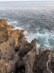 Witness documents eroded coastal rocks near Cascais, Portugal