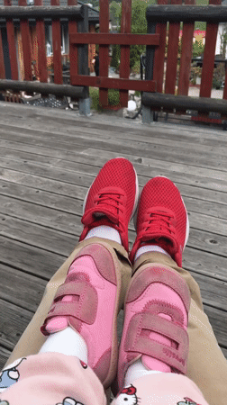 Father and toddler enjoy playful outdoor time in Wisła