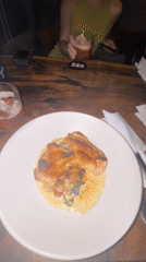 Restaurant diners document lunch meals across multiple locations