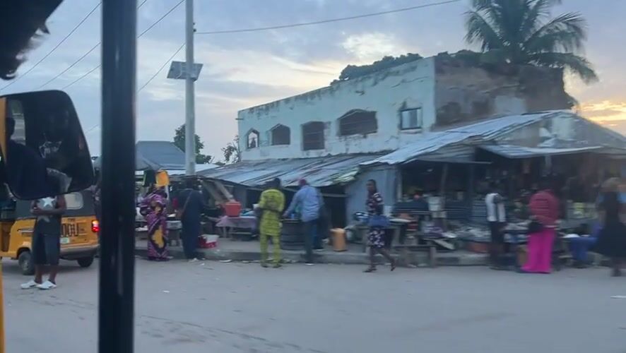 Evening street life documented across two Nigerian cities