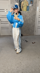 Woman records bedroom selfie videos in Abakan tracksuit session