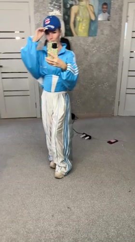 Woman records bedroom selfie videos in Abakan tracksuit session