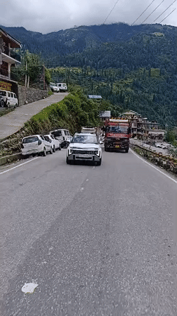 Morning traffic and riverside breaks in the Palchan valley