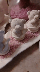 Unpainted ceramic figurines and decorative pieces on display in Wedel