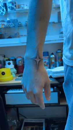 Person with star tattoo spotted near spray paint shelves