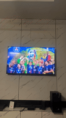 Igboefon residents watch PSG soccer on television