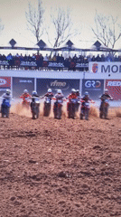 Motocross race and youth gymnastics training captured simultaneously