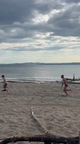 Cloudy beach day on the Yenisei shores near Krasnoturansk