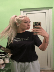 Woman takes mirror selfies at home in Plovdiv