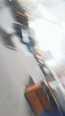 Woman carries package through Krasnoyarsk street
