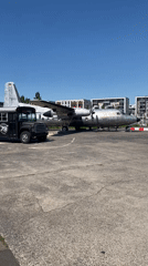 Black bus and silver plane spotted on Cologne lot