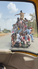 Overloaded pickup truck carries 20 passengers in Bukuru Nigeria