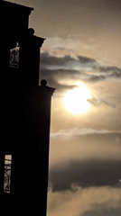 Dramatic skies and active construction documented in urban area