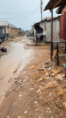 Rainy afternoon chores at a Jos residential compound
