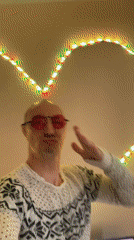 Person poses with colorful lighting in Tallinn residence