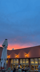 Sunset dining scene captured at Kemer rooftop restaurant