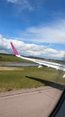 Wizz Air passenger flight documented through security to takeoff