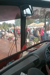 Crowds gather on muddy roads in Kenya wards