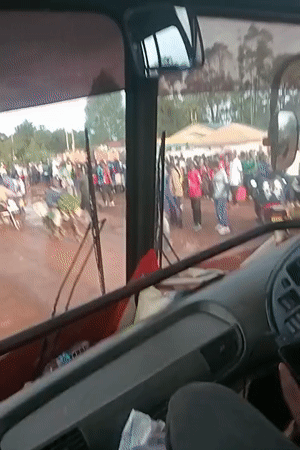 Crowds gather on muddy roads in Kenya wards