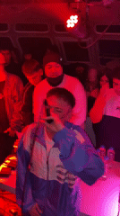 Young man performs at crowded nightclub in Beccar, Argentina
