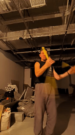 Nunchaku practice in a raw concrete space, Karaganda