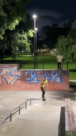 Skateboarder performs tricks at Buenos Aires skate park