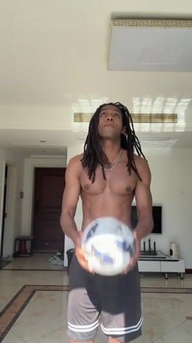 Man juggles soccer ball in Binjiang apartment morning session